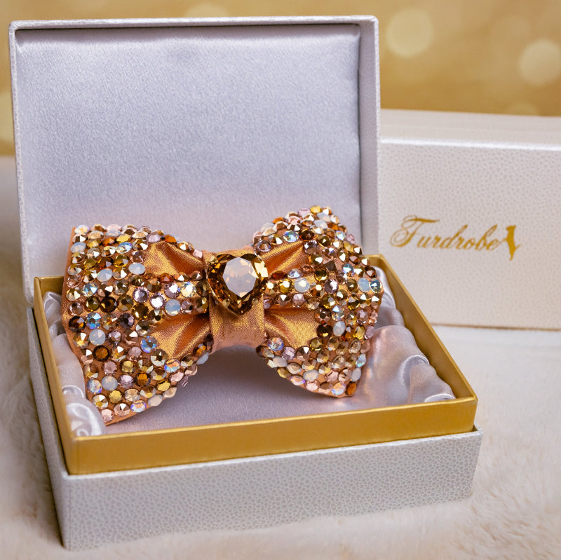 Gold dog bow with crystals in a Furdrobe branded box